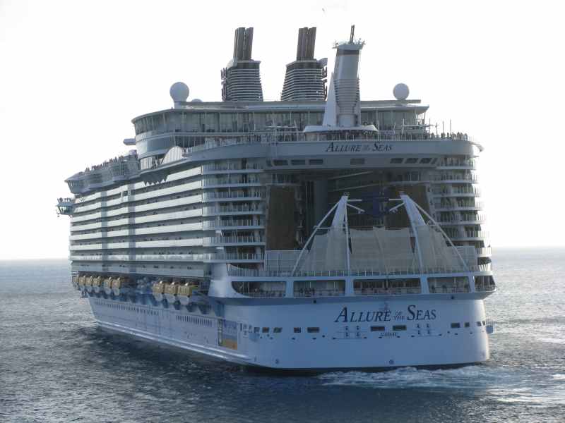 Allure of the Seas sails out ahead of us